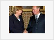 Putin e Merkel falam antes da Cimeira